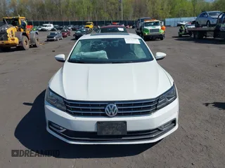 2016 Volkswagen Passat SE z VIN 1VWBT7A38GC016180, wystawiony jako IAAI lot #42132777 z przebiegiem 101 461 mil mil oraz . Historia ofert i sprzedaży dostępna na DreamBid. Obrazek 12.