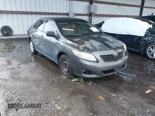 2009 Toyota Corolla with VIN 1NXBU40E79Z029500, listed as a IAAI auction lot 42797089 with 171,117 mi miles and . Bid and sale history available at DreamBid. Image 1.
