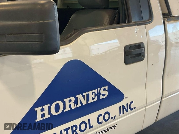 2013 Ford F-150 XL with VIN 1FTMF1CM5DKE14129, listed as a IAAI auction lot 42043964 with 174,849 mi miles and . Bid and sale history available at carsss.com. Image 1.
