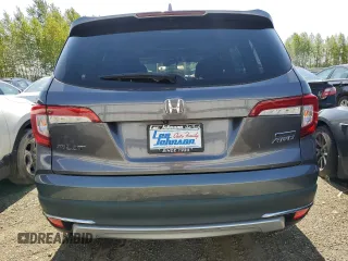 2019 Honda Pilot Touring 8-Passenger z VIN 5FNYF6H9XKB067331, wystawiony jako Copart lot #54424905 z przebiegiem 93 991 mil mil oraz Szkoda całkowita • Salvage title. Historia ofert i sprzedaży dostępna na DreamBid. Obrazek 6.