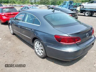 2013 Volkswagen CC Sport Plus z VIN WVWBP7AN6DE502107, wystawiony jako IAAI lot #42368496 z przebiegiem 83 505 mil mil oraz . Historia ofert i sprzedaży dostępna na DreamBid. Obrazek 3.