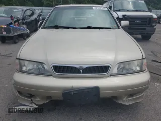 2001 Infiniti G20 Luxury z VIN JNKCP11A61T404490, wystawiony jako Copart lot #62502544 z przebiegiem 132 014 mil mil oraz Tytuł czysty. Historia ofert i sprzedaży dostępna na DreamBid. Obrazek 5.