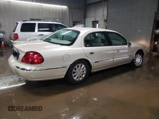 2000 Lincoln Continental with VIN 1LNHM97V2YY760288, listed as a Copart auction lot 80894624 with 115,785 mi miles and Salvage Title. Bid and sale history available at carsss.com. Image 3.