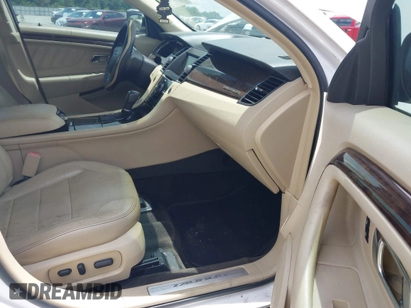 2013 Ford Taurus Limited z VIN 1FAHP2F85DG102159, wystawiony jako IAAI lot #42376184 z przebiegiem 230 568 mil mil oraz . Historia ofert i sprzedaży dostępna na DreamBid. Obrazek 5.
