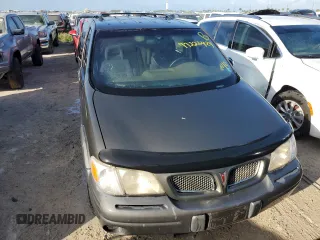 1998 Pontiac Montana z VIN 1GMDX03EXWD344453, wystawiony jako Copart lot #77226424 z przebiegiem Nie podano mil oraz Szkoda całkowita • Salvage title. Historia ofert i sprzedaży dostępna na DreamBid. Obrazek 5.