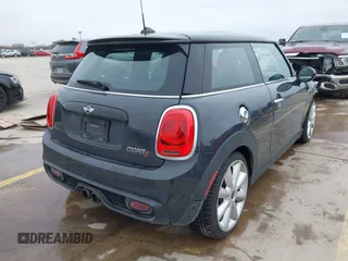 2014 MINI Hardtop S with VIN WMWXM7C56ET926604, listed as a IAAI auction lot 41642560 with 81,219 mi miles and . Bid and sale history available at DreamBid. Image 4.