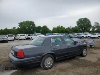2004 Ford Police Interceptor Base w/3.27 Axle с VIN 2FAFP71W44X176581, выставлен на аукционе Copart как лот 58035125 с пробегом 166 615 миль миль и Списание • Salvage title. История ставок и продаж доступна на DreamBid. Изображение 3.