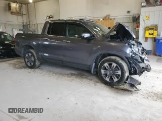 2018 Honda Ridgeline RTL-E z VIN 5FPYK3F77JB007492, wystawiony jako Copart lot #43716475 z przebiegiem Nie podano mil oraz Szkoda całkowita • Salvage title. Historia ofert i sprzedaży dostępna na DreamBid. Obrazek 4.