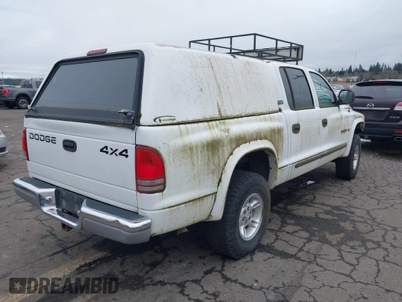 2000 Dodge Dakota Sport with VIN 1B7GG2AN2YS760690, listed as a IAAI auction lot 41616767 with 225,478 mi miles and . Bid and sale history available at carsss.com. Image 4.