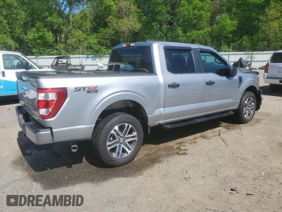 2023 Ford F-150 XL with VIN 1FTFW1E55PKF18784, listed as a Copart auction lot 52807315 with 15,284 mi miles and Salvage Title. Bid and sale history available at carsss.com. Image 3.