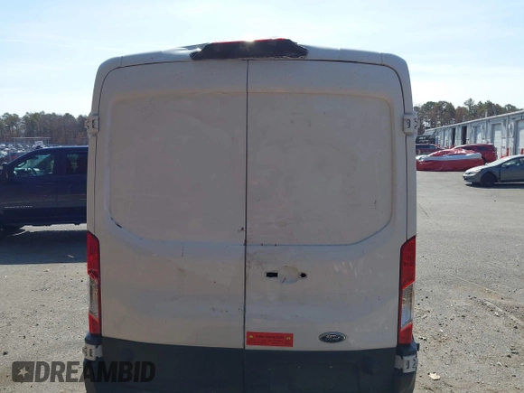 2019 Ford Transit z VIN 1FTBW2CM9KKA40635, wystawiony jako IAAI lot #41660193 z przebiegiem 54 244 mil mil oraz . Historia ofert i sprzedaży dostępna na DreamBid. Obrazek 15.