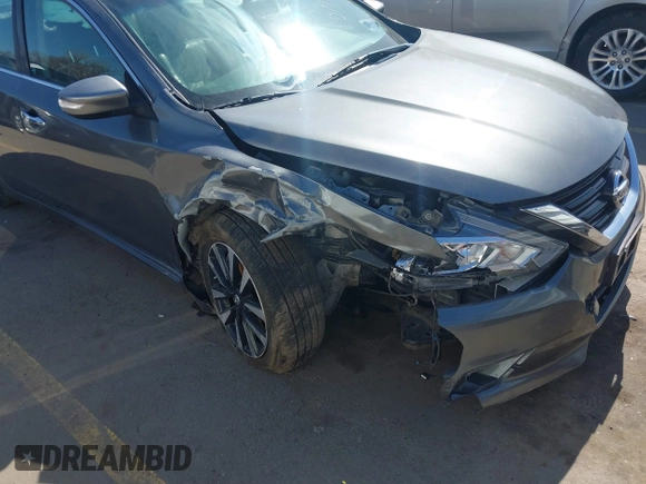 2018 Nissan Altima SR with VIN 1N4AL3AP5JC243138, listed as a IAAI auction lot 41750643 with 123,601 mi miles and . Bid and sale history available at carsss.com. Image 6.
