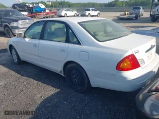 2002 Toyota Avalon XL with VIN 4T1BF28B12U217380, listed as a IAAI auction lot 42092083 with 277,271 mi miles. Bid and sale history available at carsss.com. Image 3.