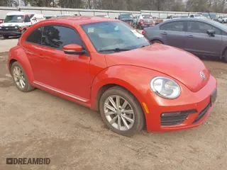 2018 Volkswagen Beetle S with VIN 3VWFD7AT0JM711483, listed as a IAAI auction lot 41506394 with 100,321 mi miles. Bid and sale history available at carsss.com. Image 1.