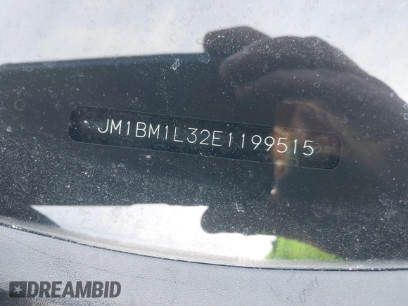 2014 Mazda 3 S Touring with VIN JM1BM1L32E1199515, listed as a IAAI auction lot 41783271 with 152,443 mi miles and . Bid and sale history available at DreamBid. Image 17.