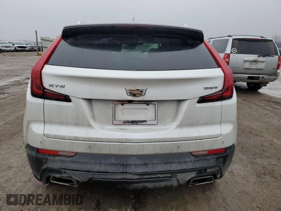 2021 Cadillac XT4 FWD Luxury z VIN 1GYAZAR48MF018135, wystawiony jako Copart lot #43023665 z przebiegiem 54 271 mil mil oraz Szkoda całkowita • Salvage title. Historia ofert i sprzedaży dostępna na DreamBid. Obrazek 6.