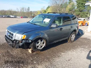 2012 Ford Escape XLT with VIN 1FMCU9D77CKB63827, listed as a IAAI auction lot 42044393 with 231,933 mi miles and . Bid and sale history available at DreamBid. Image 2.