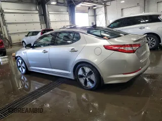 2013 Kia Optima Hybrid LX with VIN KNAGM4AD9D5052938, listed as a Copart auction lot 71797564 with 123,602 mi miles and Salvage Title. Bid and sale history available at carsss.com. Image 2.