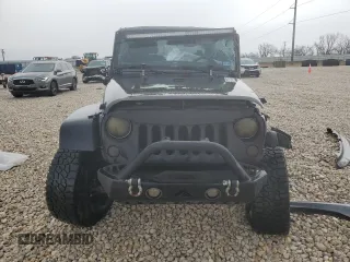 2017 Jeep Wrangler Willys Wheeler with VIN 1C4AJWAG9HL673766, listed as a Copart auction lot 43132555 with 129,422 mi miles and Salvage Title. Bid and sale history available at DreamBid. Image 5.