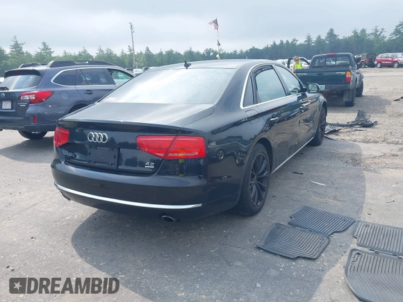 2012 Audi A8 with VIN WAURVAFDXCN017546, listed as a IAAI auction lot 39830968 with 123,089 mi miles and . Bid and sale history available at DreamBid. Image 4.