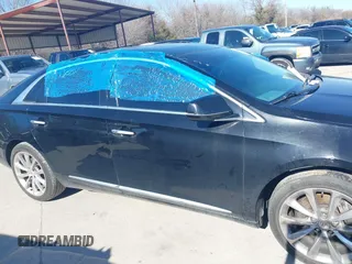 2013 Cadillac XTS Luxury with VIN 2G61P5S31D9116567, listed as a IAAI auction lot 41668056 with 196,744 mi miles. Bid and sale history available at carsss.com. Image 13.