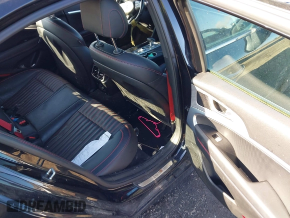 2023 Genesis G70 2.0T z VIN KMTG34TA8PU110168, wystawiony jako IAAI lot #41924246 z przebiegiem 117 927 mil mil oraz . Historia ofert i sprzedaży dostępna na DreamBid. Obrazek 8.