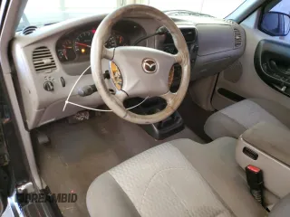 2001 Mazda B-Series 2WD Truck DS with VIN 4F4YR16V41TM25326, listed as a Copart auction lot 88433645 with 207,857 mi miles and Salvage Title. Bid and sale history available at carsss.com. Image 8.