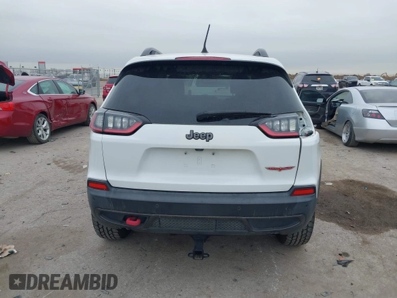 2019 Jeep Cherokee Trailhawk with VIN 1C4PJMBN6KD124023, listed as a IAAI auction lot 41432217 with 76,934 mi miles and . Bid and sale history available at DreamBid. Image 17.