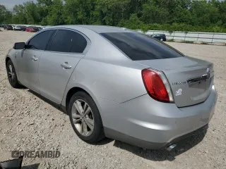 2009 Lincoln MKS with VIN 1LNHM93RX9G604306, listed as a Copart auction lot 57059605 with 177,871 mi miles and Salvage title. Bid and sale history available at DreamBid. Image 2.