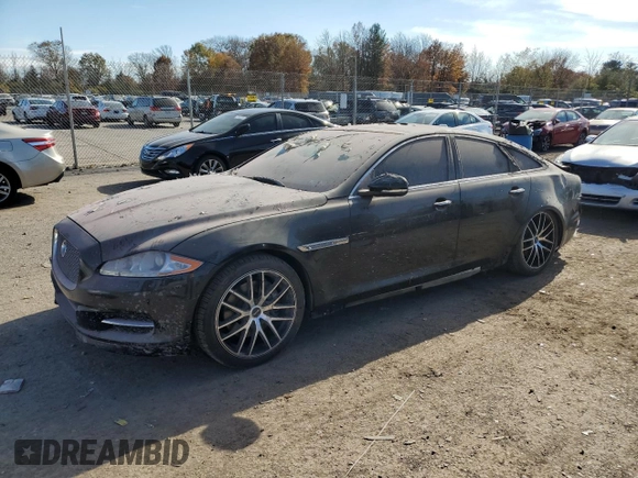 2015 Jaguar XJ with VIN SAJWJ1CD1F8V90815, listed as a Copart auction lot 77977464 with Not provided miles and Salvage title. Bid and sale history available at DreamBid. Image 1.