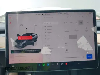2023 Tesla Model 3 with VIN 5YJ3E1EA5PF565071, listed as a IAAI auction lot 42232719 with 15,389 mi miles and . Bid and sale history available at DreamBid. Image 19.