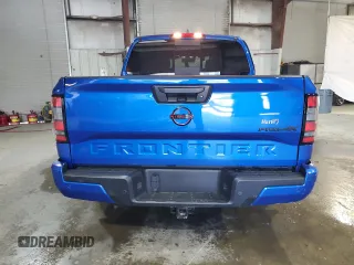 2024 Nissan Frontier SV z VIN 1N6ED1EK5RN615750, wystawiony jako Copart lot #54297595 z przebiegiem 7028 mil mil oraz Szkody całkowita. Historia ofert i sprzedaży dostępna na DreamBid. Obrazek 6.