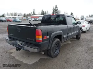 2000 Chevrolet Silverado 1500 LS with VIN 2GCEK19TXY1268976, listed as a IAAI auction lot 41909832 with 182,557 mi miles. Bid and sale history available at carsss.com. Image 4.