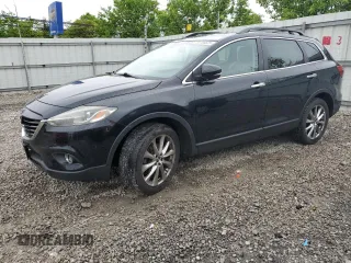 2014 Mazda CX-9 Grand Touring with VIN JM3TB3DA5E0432058, listed as a Copart auction lot 56766625 with 128,405 mi miles and Clean Title. Bid and sale history available at DreamBid. Image 1.