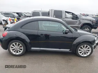 2017 Volkswagen Beetle 1.8T SE with VIN 3VWJ17AT9HM618202, listed as a IAAI auction lot 41562078 with 101,808 mi miles. Bid and sale history available at carsss.com. Image 13.