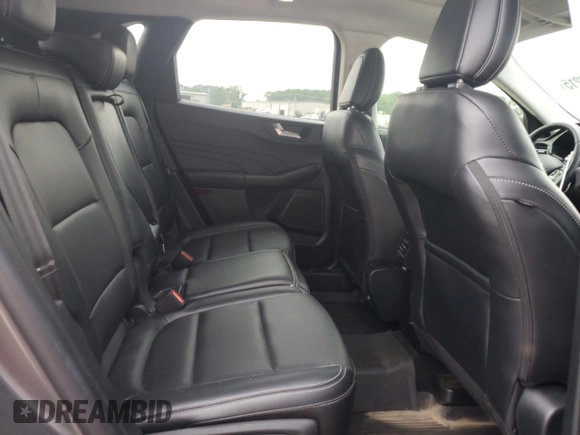 2021 Ford Escape SEL with VIN 1FMCU9H68MUB09069, listed as a Copart auction lot 58760215 with 27,694 mi miles and Salvage title. Bid and sale history available at DreamBid. Image 11.