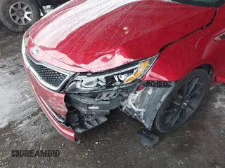 2014 Kia Optima SX Turbo with VIN 5XXGR4A60EG286453, listed as a IAAI auction lot 41661379 with 163,206 mi miles and . Bid and sale history available at DreamBid. Image 6.