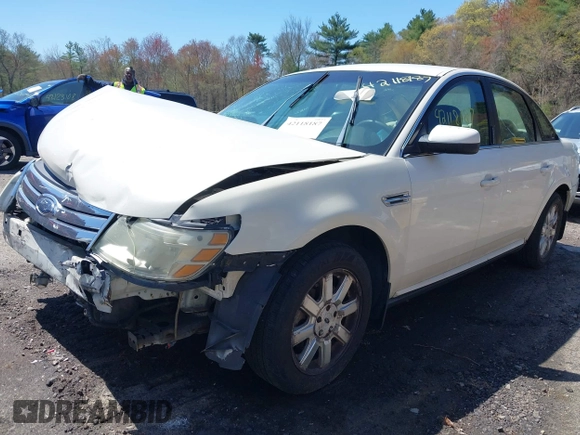 2009 Ford Taurus SE with VIN 1FAHP23W89G113022, listed as a IAAI auction lot 42118187 with 135,319 mi miles. Bid and sale history available at carsss.com. Image 2.