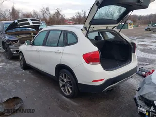 2013 BMW X1 28i with VIN WBAVM1C58DVW45962, listed as a IAAI auction lot 41323144 with 117,363 mi miles. Bid and sale history available at carsss.com. Image 3.