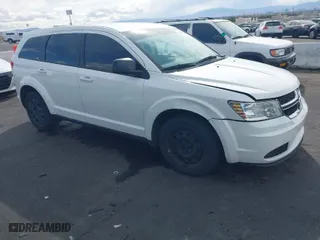 2015 Dodge Journey American Value Pkg with VIN 3C4PDCAB7FT684318, listed as a IAAI auction lot 41950431 with 175,142 mi miles. Bid and sale history available at carsss.com. Image 1.