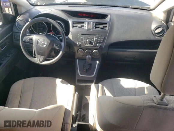 2012 Mazda 5 Sport with VIN JM1CW2BL9C0103114, listed as a Copart auction lot 49910085 with 130,850 mi miles and Salvage Title. Bid and sale history available at DreamBid. Image 8.