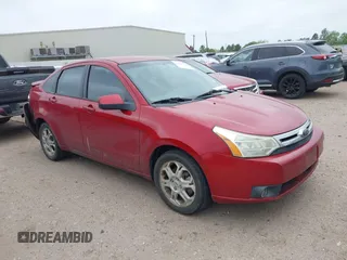 2009 Ford Focus SES with VIN 1FAHP36N59W244231, listed as a IAAI auction lot 41967664 with 141,937 mi miles. Bid and sale history available at carsss.com. Image 1.