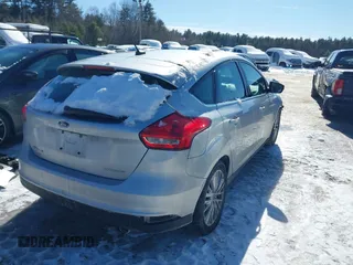 2017 Ford Focus Titanium with VIN 1FADP3N29HL268084, listed as a IAAI auction lot 41618194 with Not Provided miles and . Bid and sale history available at carsss.com. Image 4.