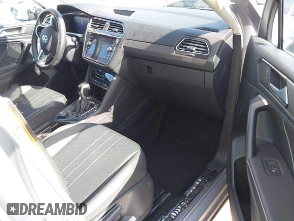 2023 Volkswagen Tiguan SE z VIN 3VV2B7AX0PM034519, wystawiony jako IAAI lot #41723470 z przebiegiem 17 250 mil mil oraz . Historia ofert i sprzedaży dostępna na DreamBid. Obrazek 5.