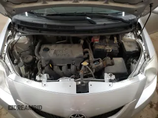2012 Toyota Yaris z VIN JTDBT4K30CL016555, wystawiony jako Copart lot #55605565 z przebiegiem 164 046 mil mil oraz Szkoda całkowita • Salvage title. Historia ofert i sprzedaży dostępna na DreamBid. Obrazek 11.