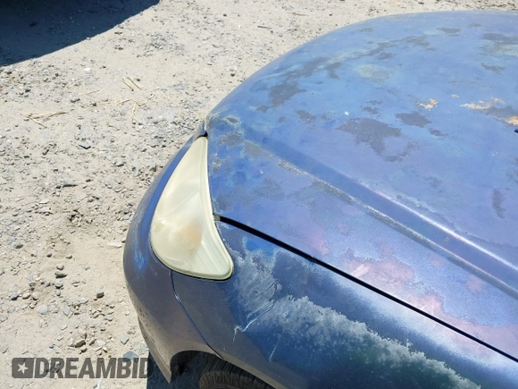 2004 Honda Civic LX z VIN 2HGES16554H605210, wystawiony jako IAAI lot #42349566 z przebiegiem 332 807 mil mil oraz . Historia ofert i sprzedaży dostępna na DreamBid. Obrazek 6.