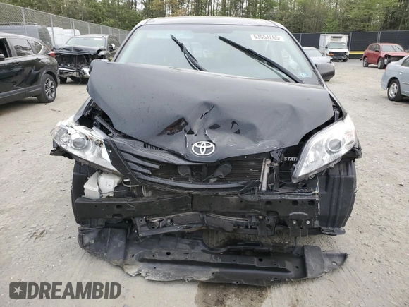 2017 Toyota Sienna L z VIN 5TDZZ3DC1HS786239, wystawiony jako Copart lot #53664265 z przebiegiem Nie podano mil oraz Szkoda całkowita • Salvage title. Historia ofert i sprzedaży dostępna na DreamBid. Obrazek 5.