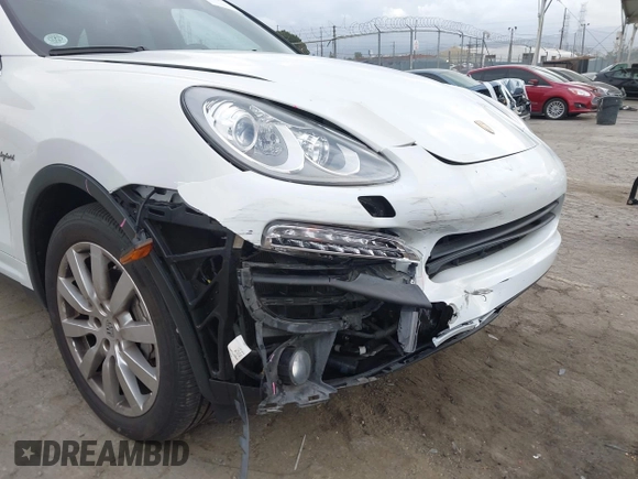 2014 Porsche Cayenne S Hybrid with VIN WP1AE2A28ELA51123, listed as a IAAI auction lot 42091475 with 41,341 mi miles and . Bid and sale history available at DreamBid. Image 6.