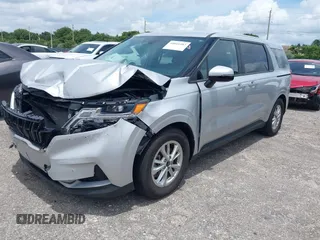 2023 Kia Carnival LX with VIN KNDNB4H35P6235684, listed as a IAAI auction lot 40016483 with 42,644 mi miles. Bid and sale history available at carsss.com. Image 2.