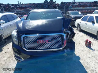 2016 GMC Yukon XL Denali with VIN 1GKS1HKJ5GR435925, listed as a IAAI auction lot 41727259 with 137,098 mi miles. Bid and sale history available at carsss.com. Image 12.